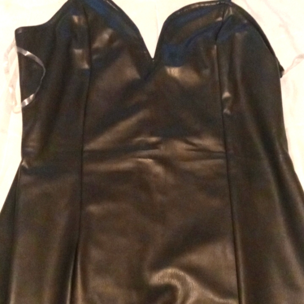 Cute lil black leather like material